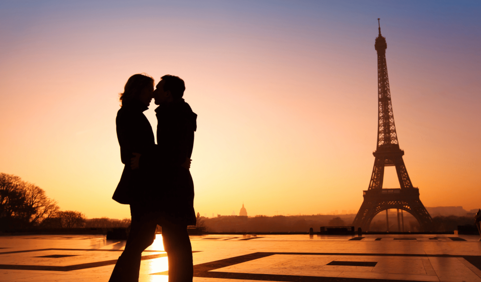 couple Paris with Eiffel Tower in the background