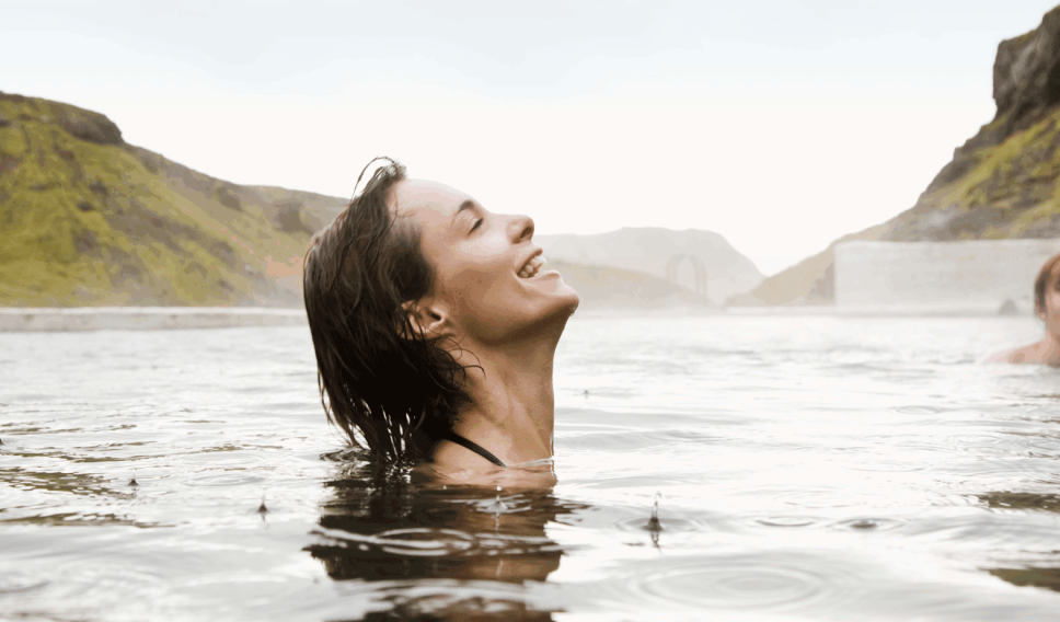 Couple in hot springs in Iceland